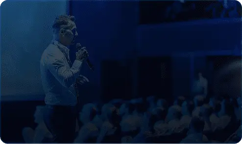 Speaker addressing the audience at a TechWhizz stage session