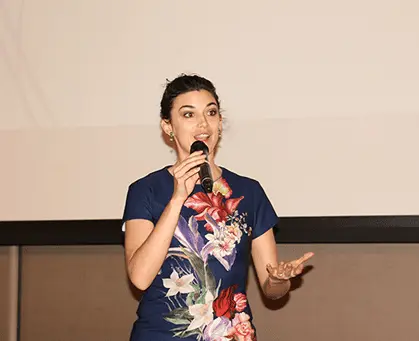 TechWhizz gallery image showing a presenter speaking on stage